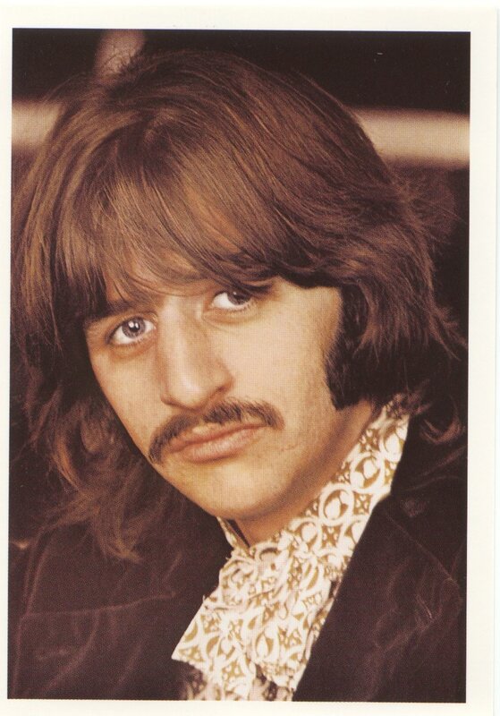 man with mustache and long hair