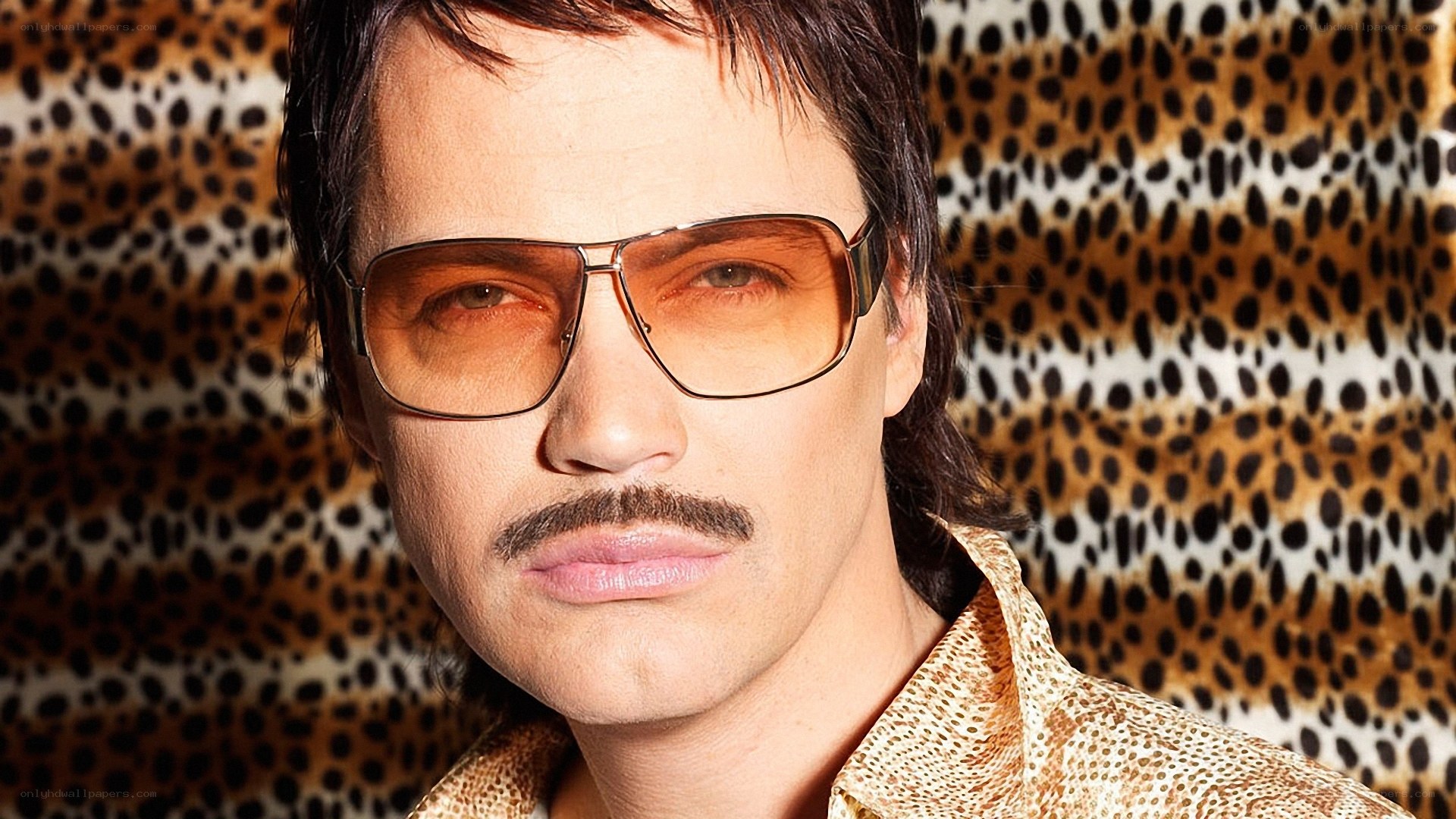 man with mustache and sunglasses