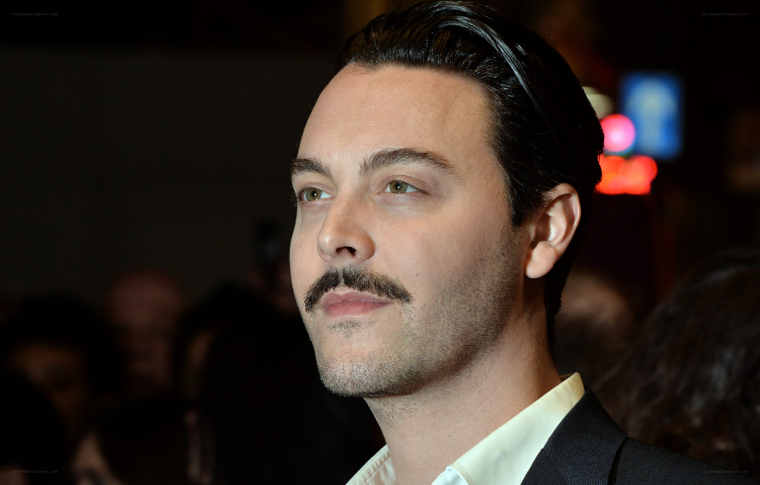 man with mustache at event