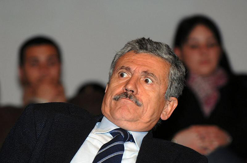 man with mustache in audience
