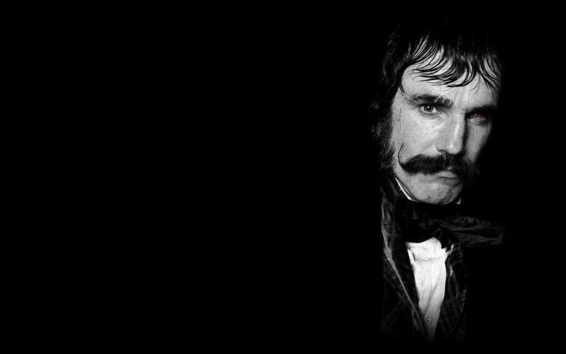 man with mustache in black and white