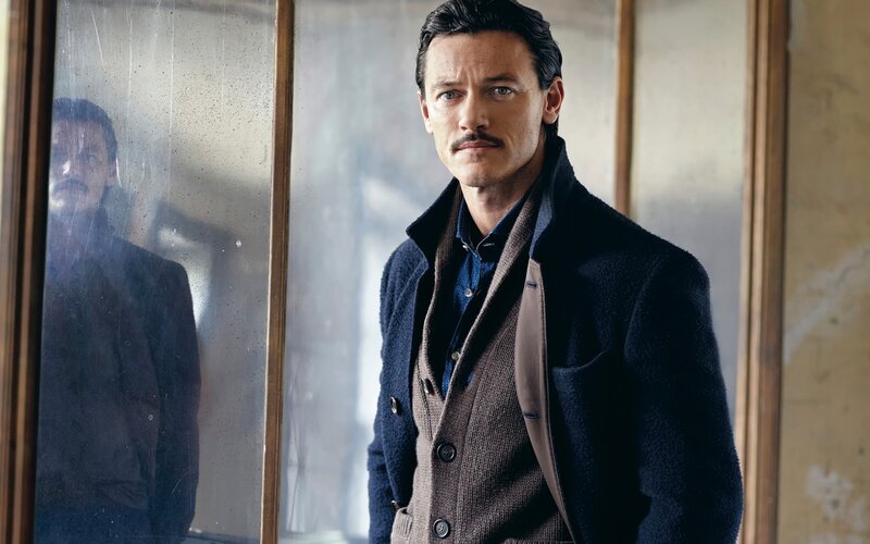 Man with Mustache in Coat