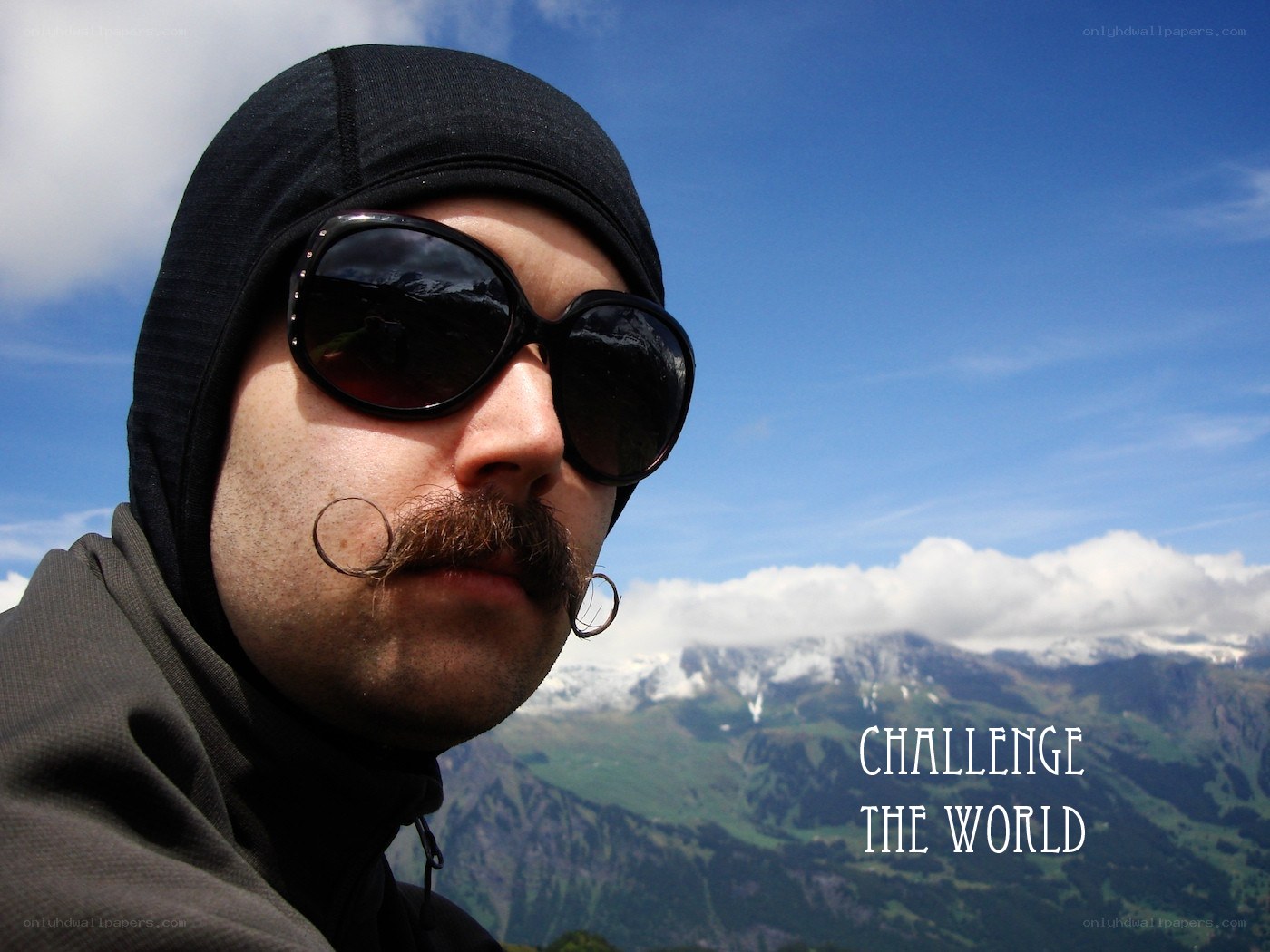 man with mustache in mountains