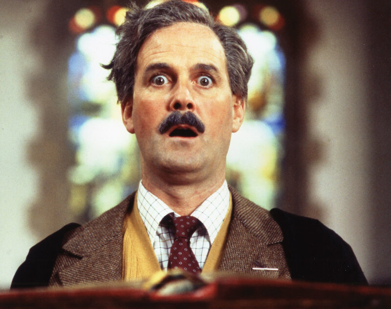 man with mustache looking surprised