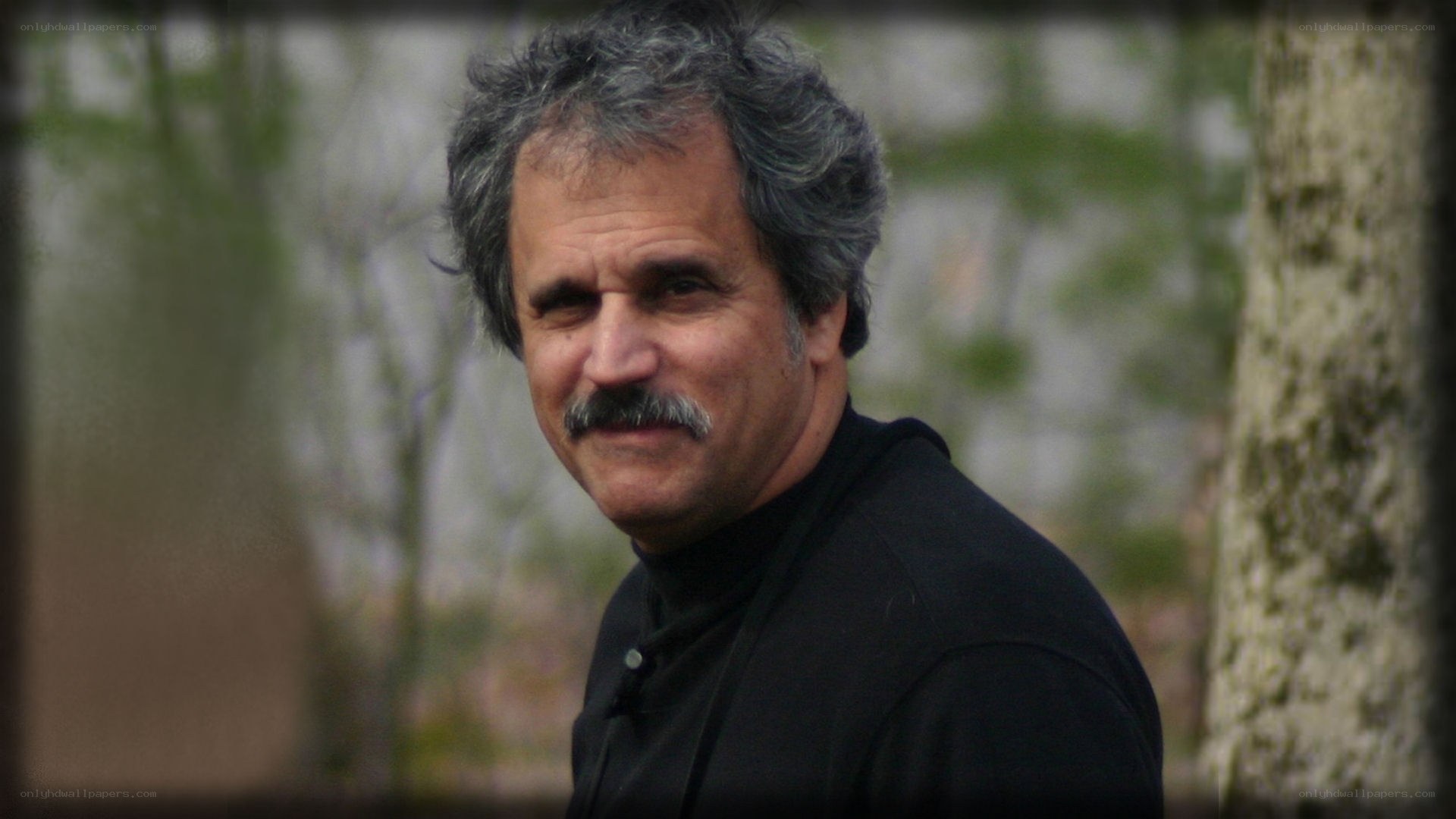 man with mustache outdoors