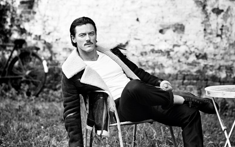 Man with Mustache Sitting — Black