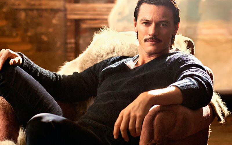 Man with Mustache Sitting — Brown