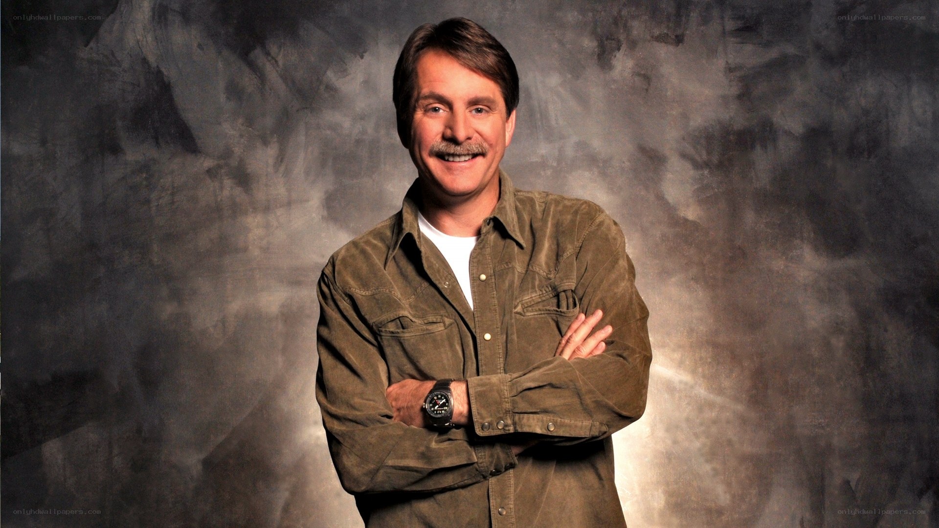man with mustache smiling