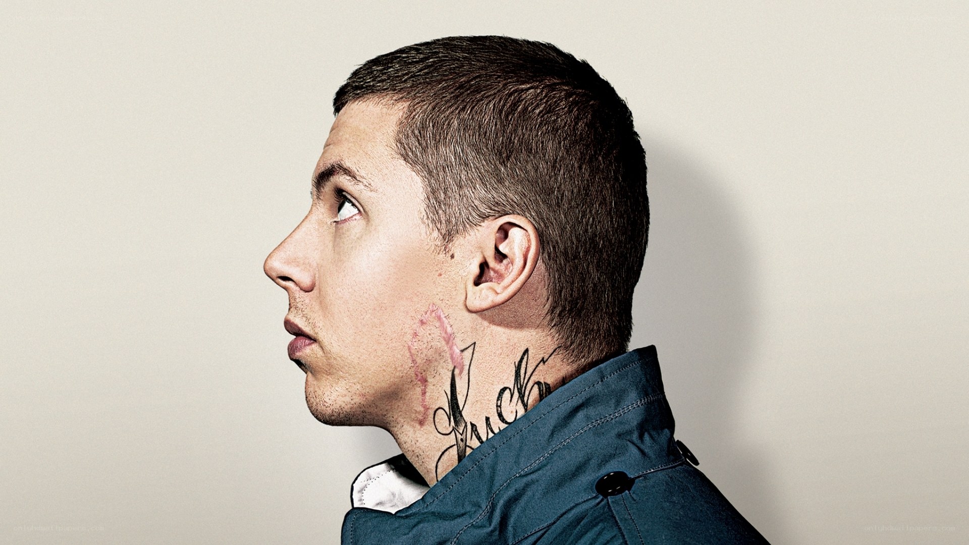 man with neck tattoo