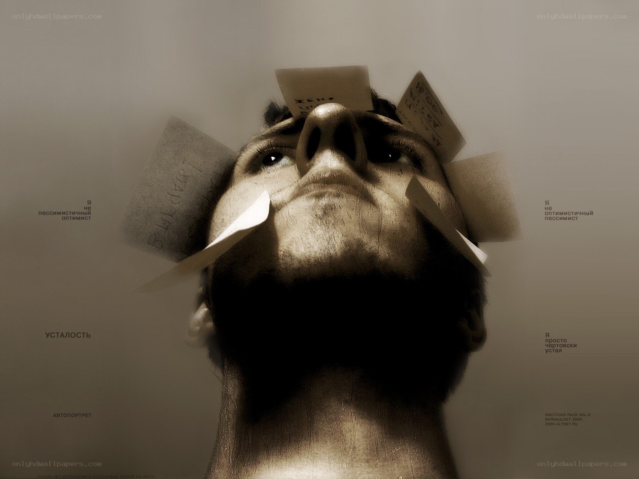 man with notes on face