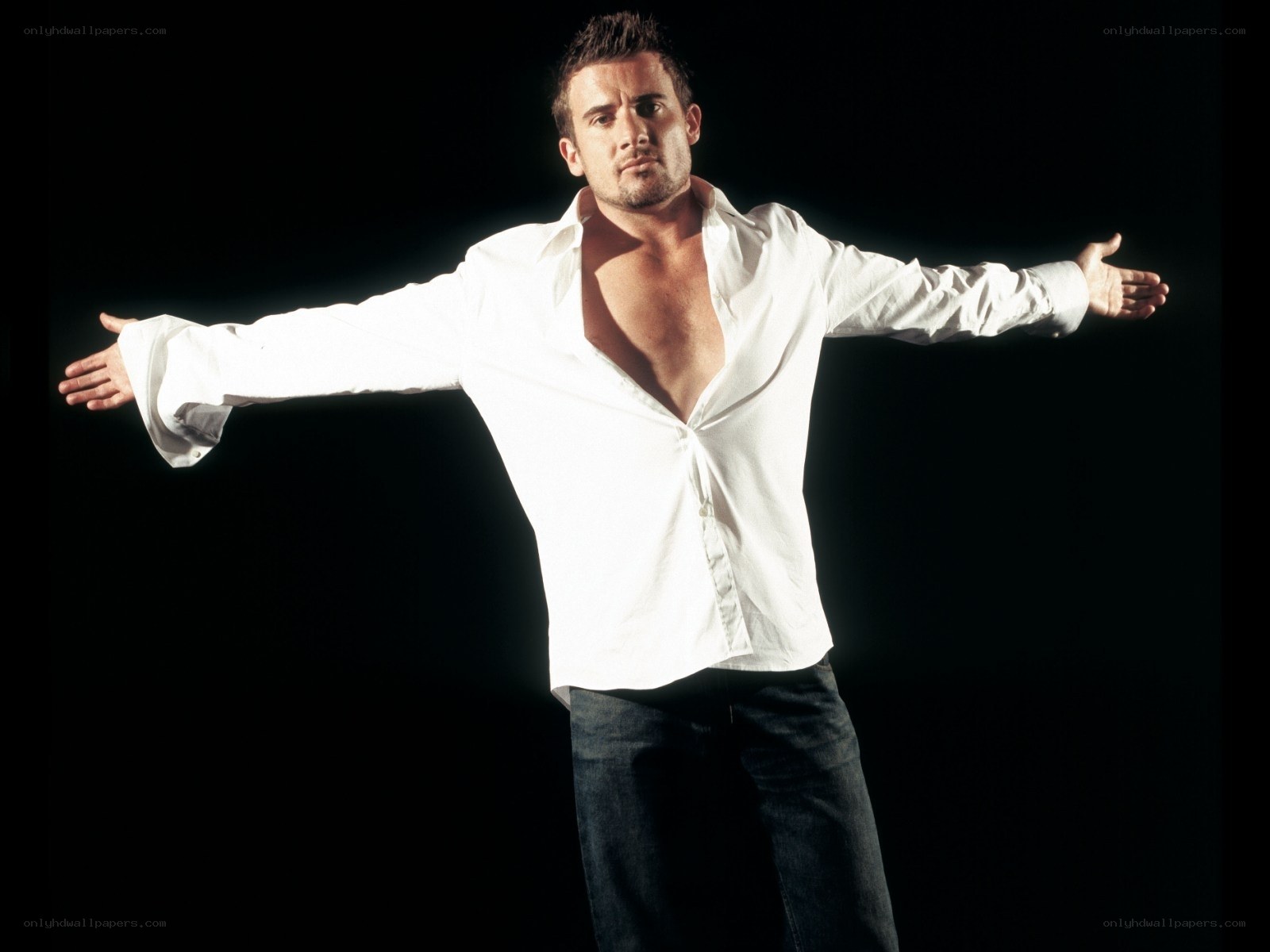 man with open white shirt