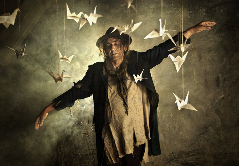 Man with Origami Cranes