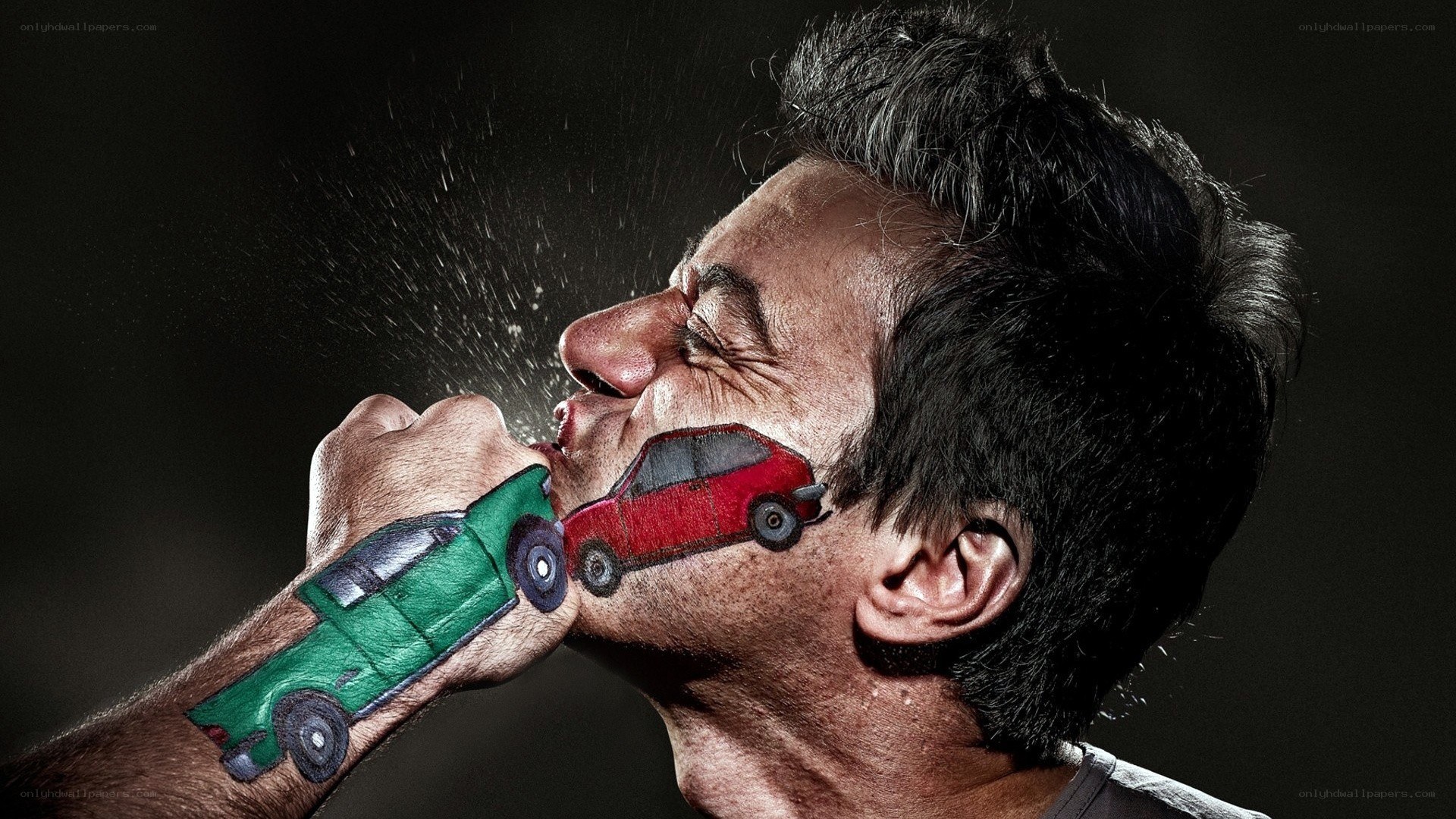 Man with painted cars on face