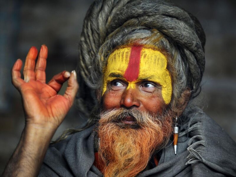 Man with Painted Face — Yellow, Serious