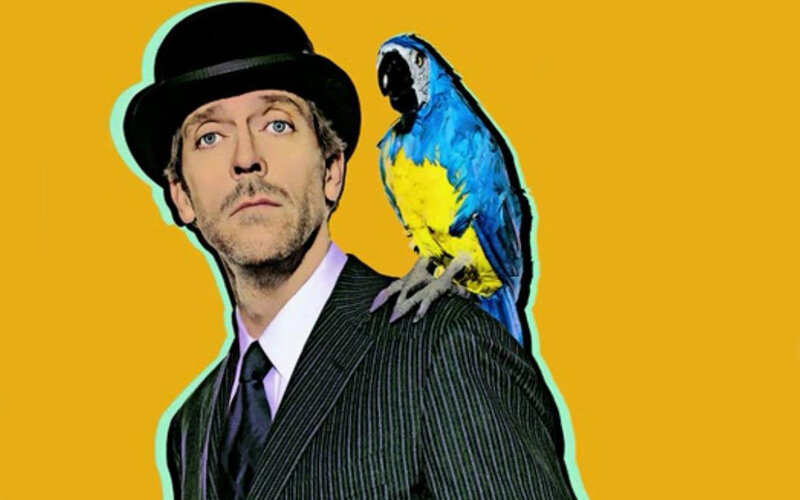 man with parrot on shoulder
