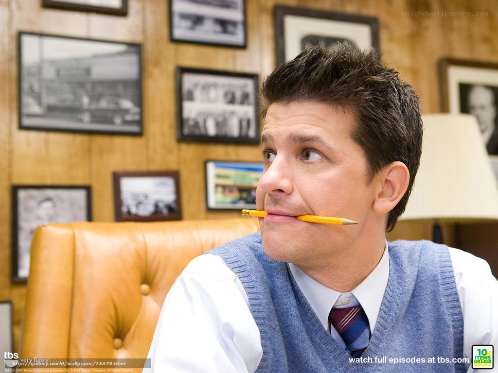 man with pencil in mouth