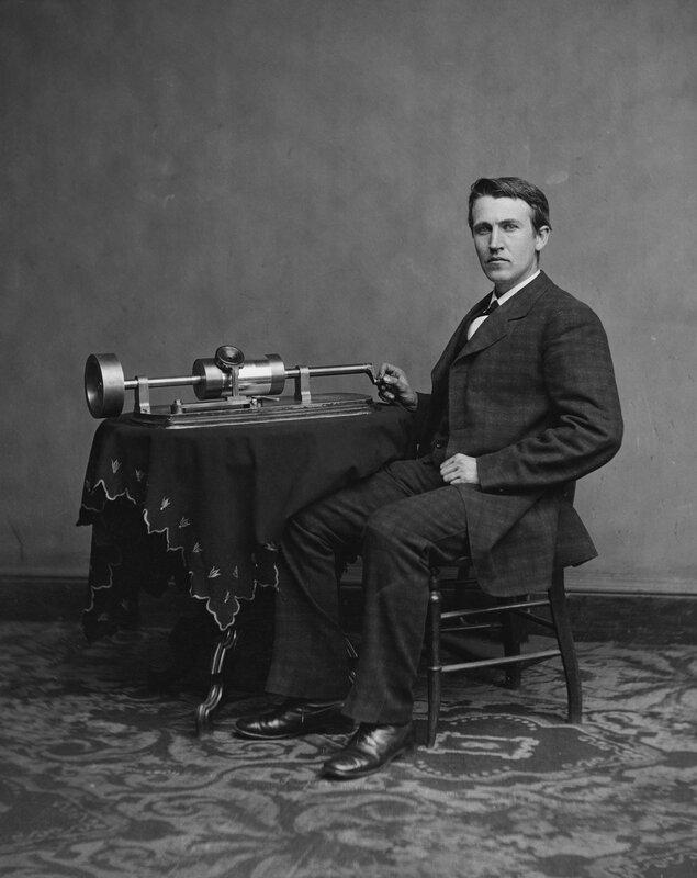 Man with phonograph machine