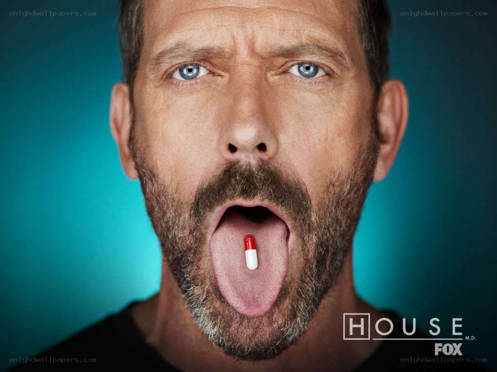 man with pill on tongue