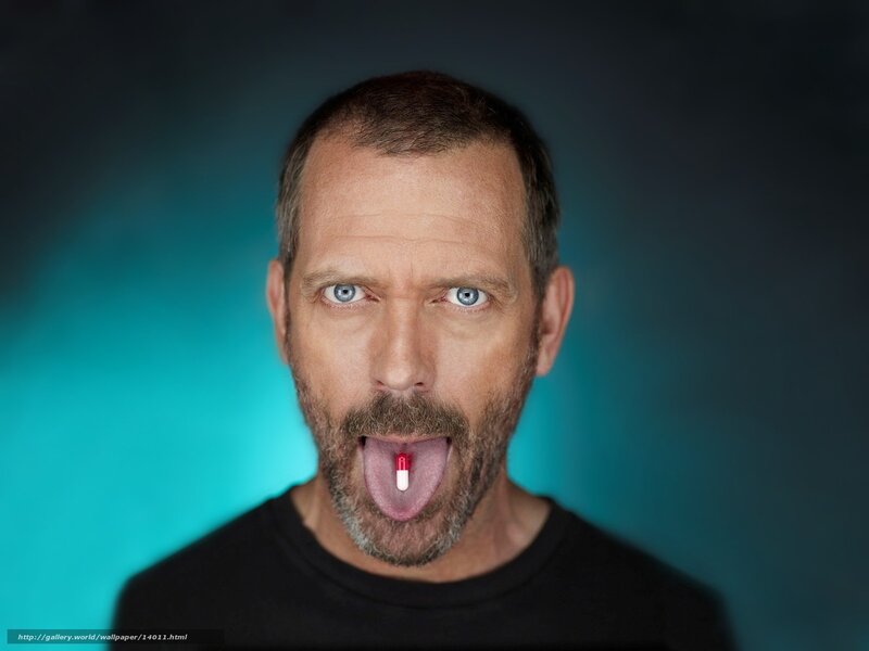 man with pill on tongue