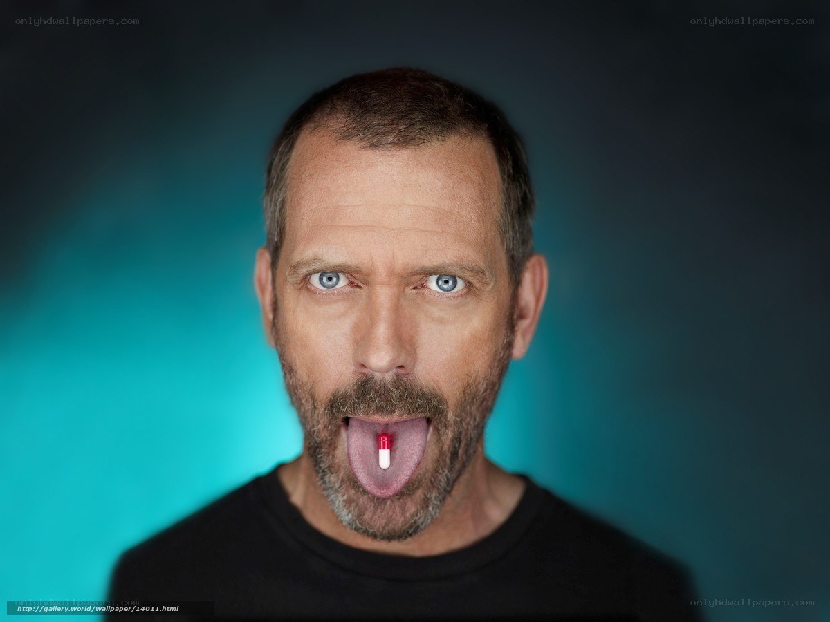 man with pill on tongue