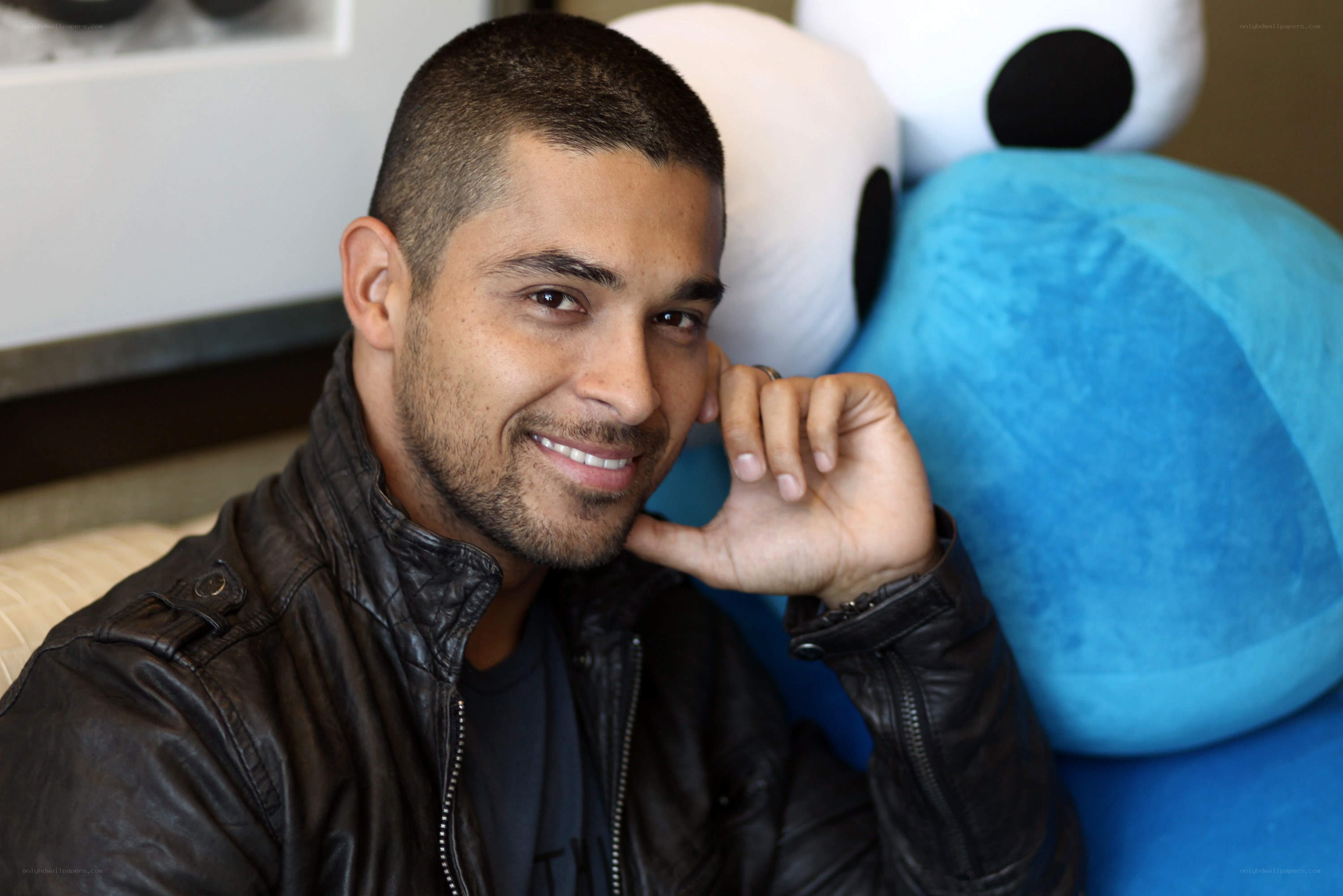 man with plush toys