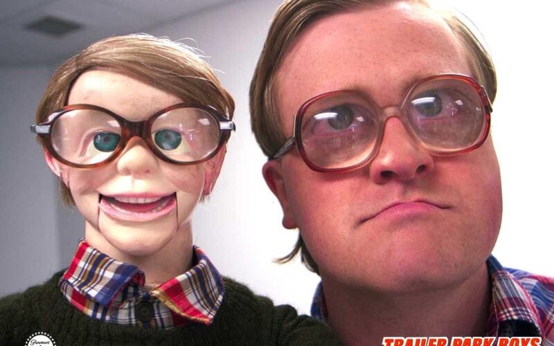 man with puppet in glasses