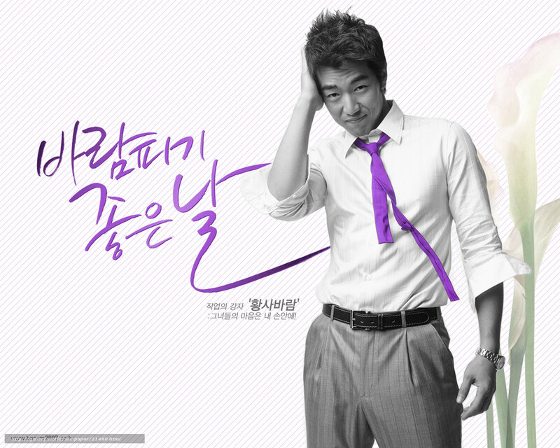 Man with purple tie posing