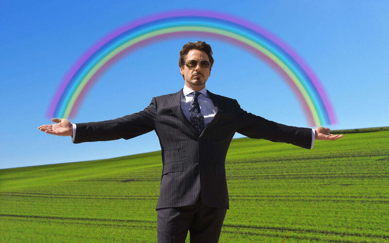 man with rainbow background