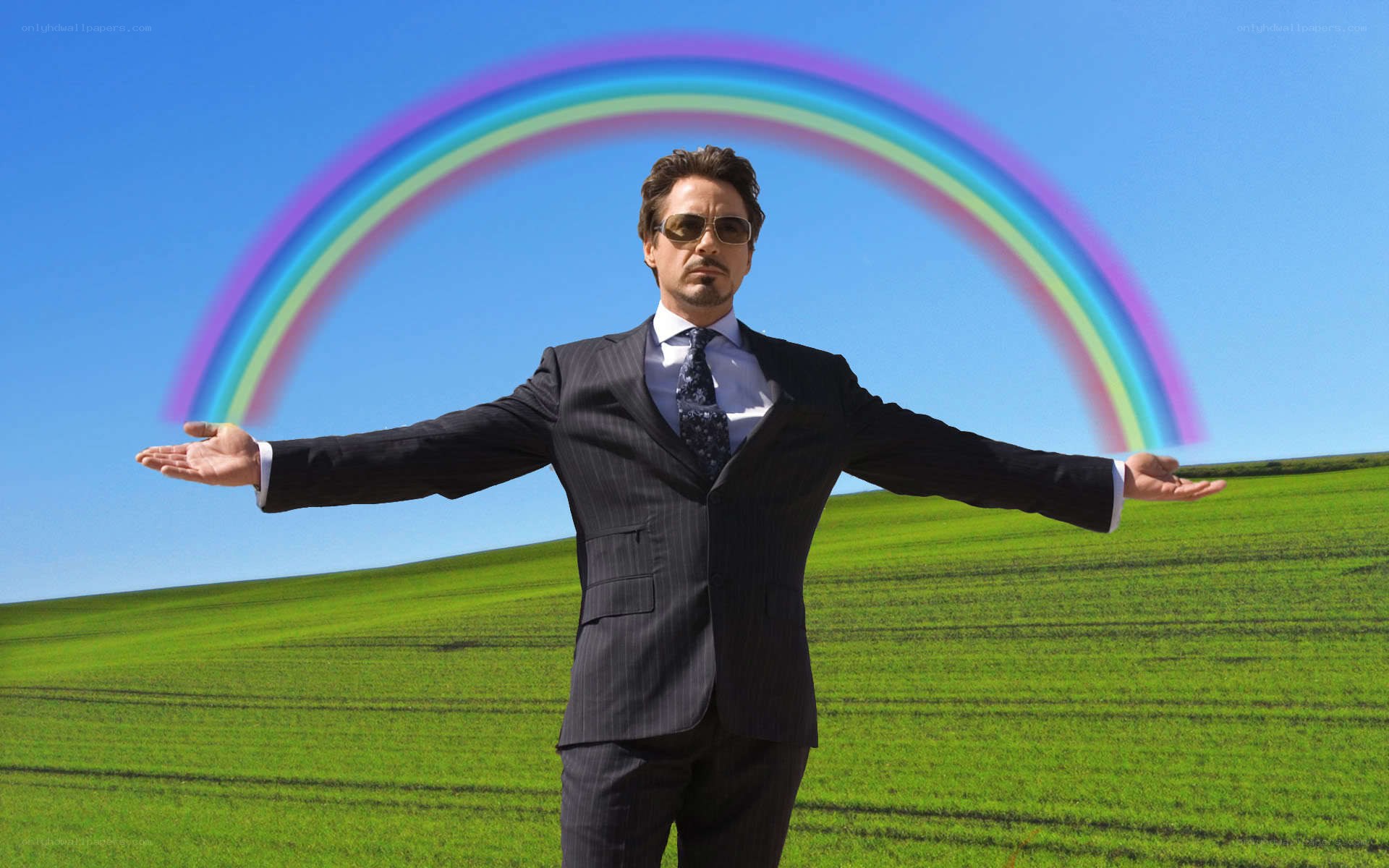man with rainbow background