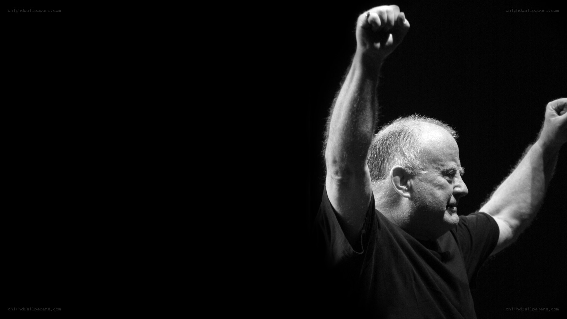 Man with raised fists