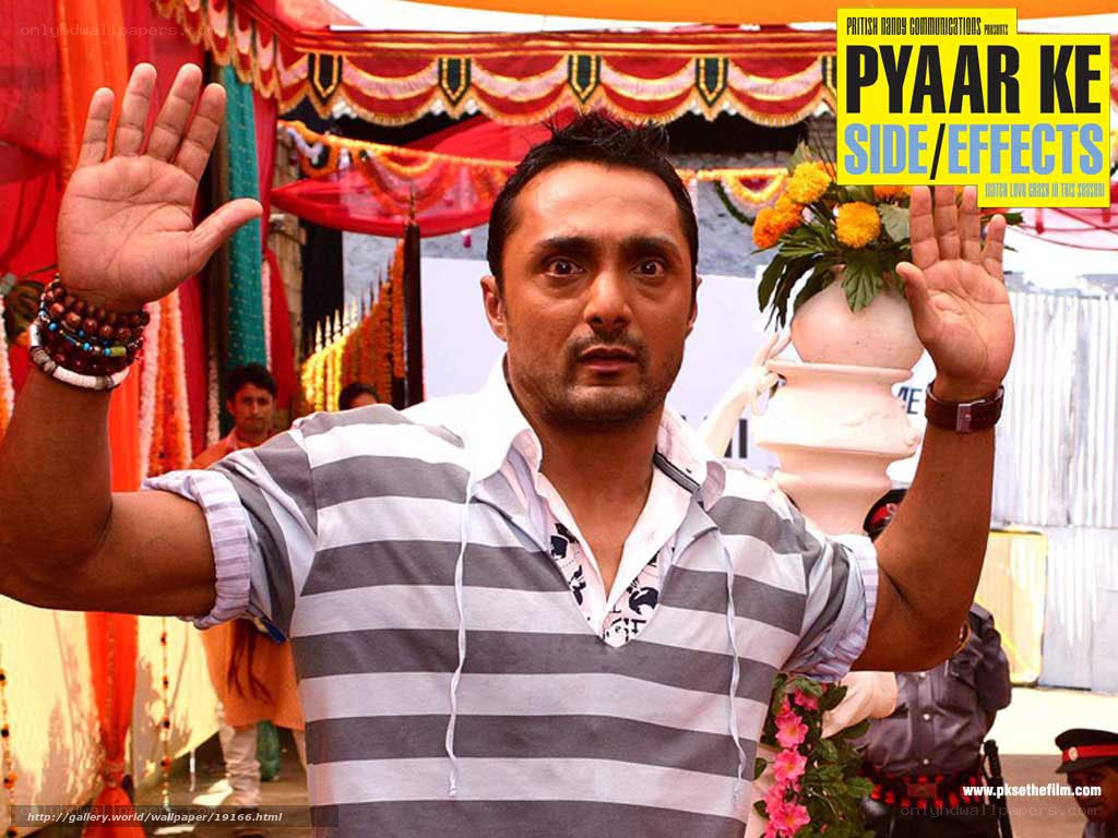 Man with raised hands at event