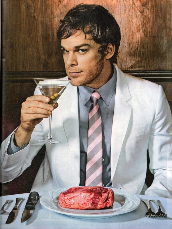 Man with raw meat and martini