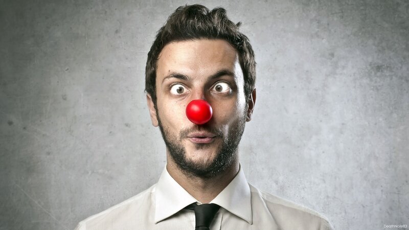 man with red clown nose