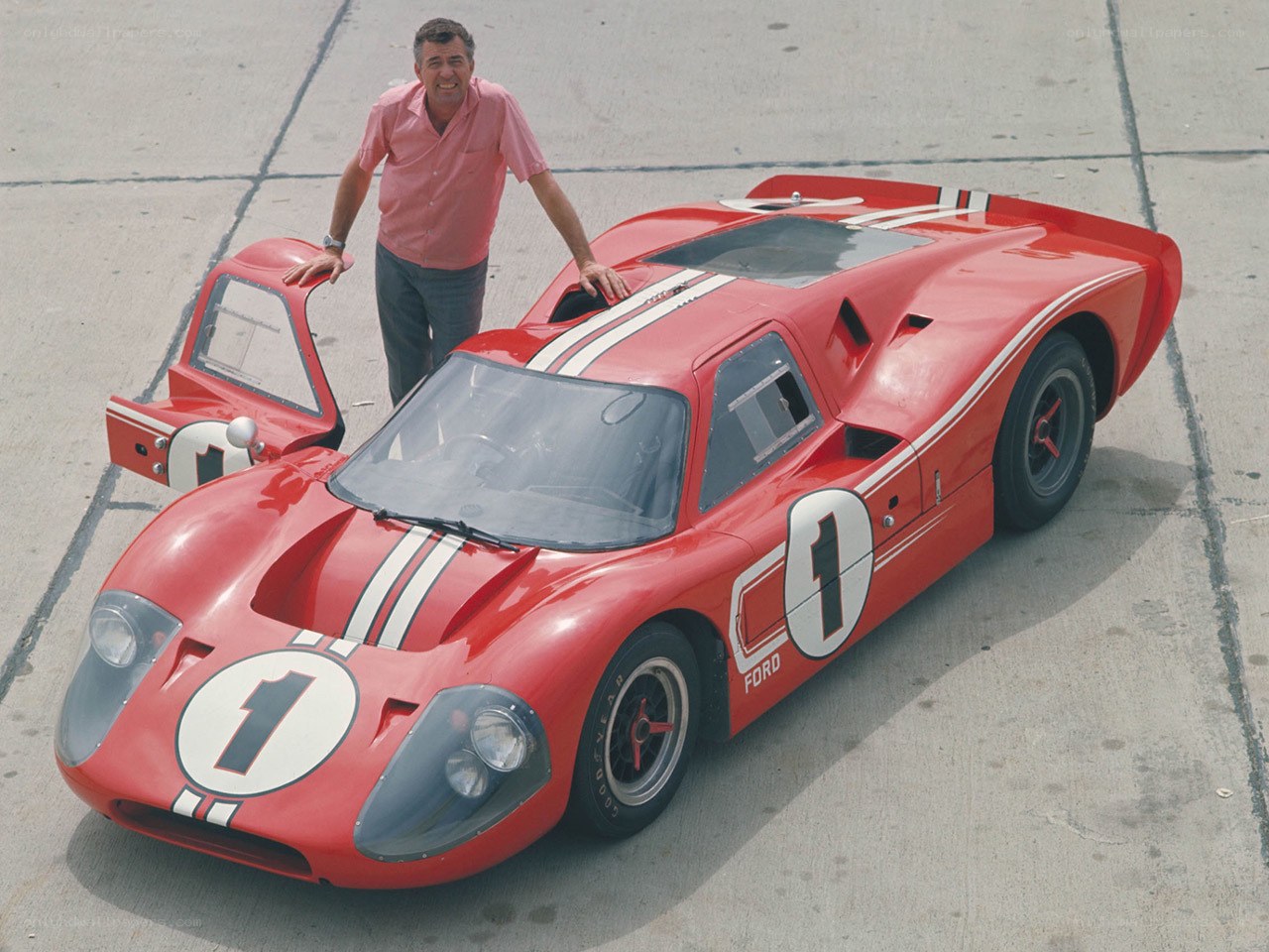 Man with red race car