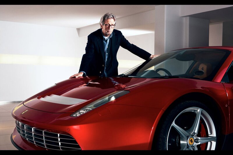 Man with red sports car