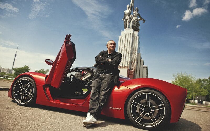 Man with Red Sports Car — Dramatic, Afternoon