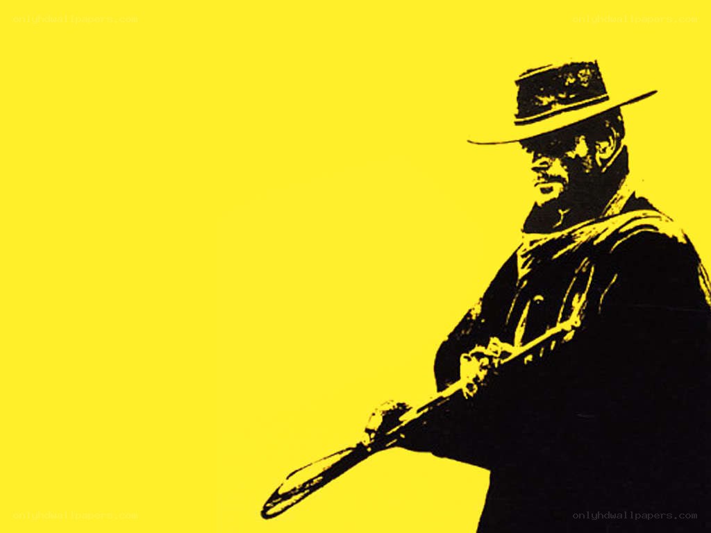 man with rifle in yellow