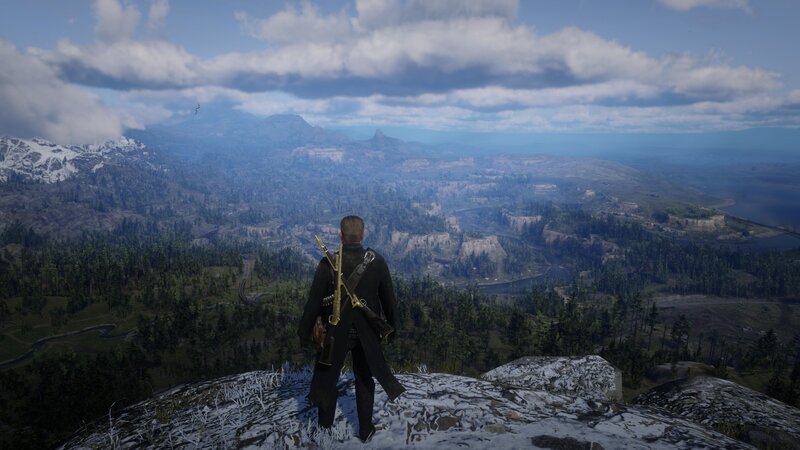Man with Rifle on Cliff