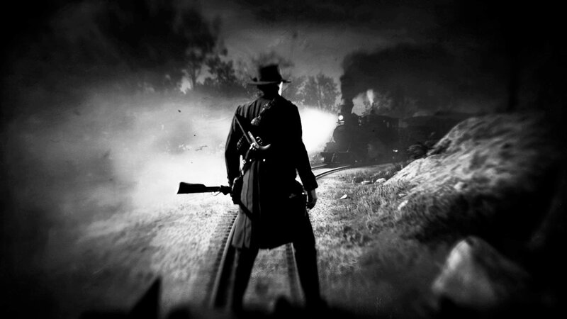 Man with Rifle on Train Tracks