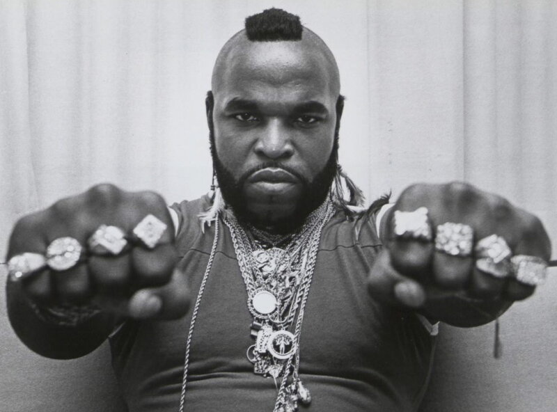 man with rings and chains