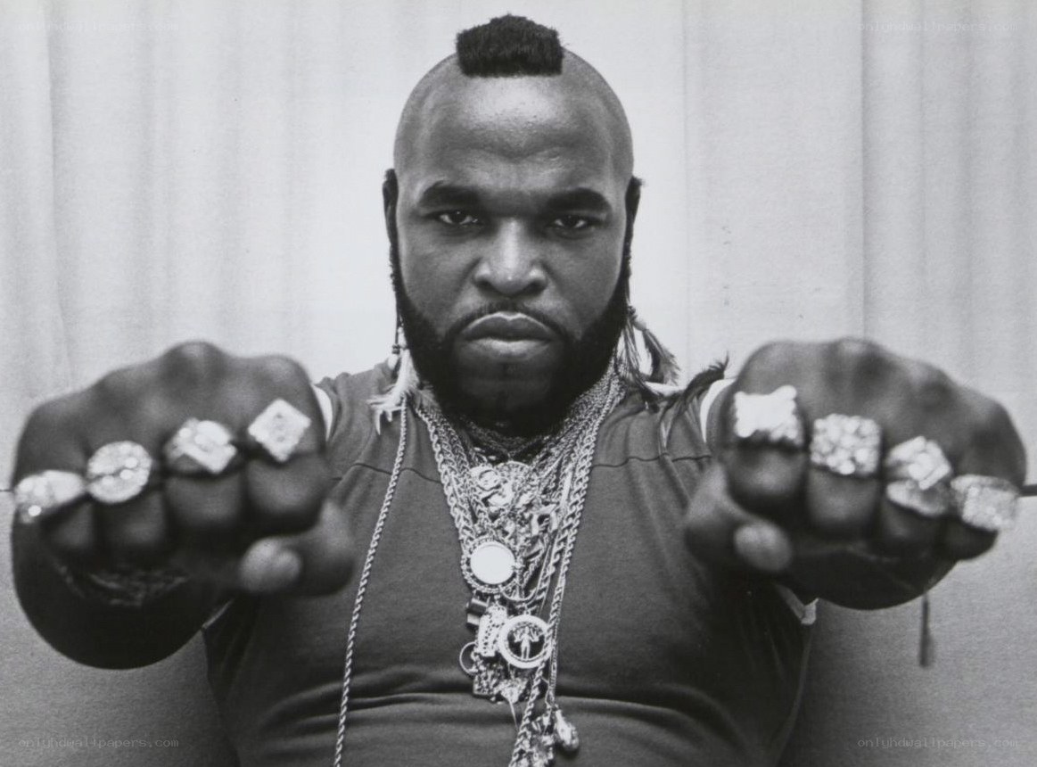 man with rings and chains