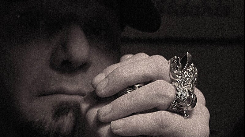 man with rings on hand