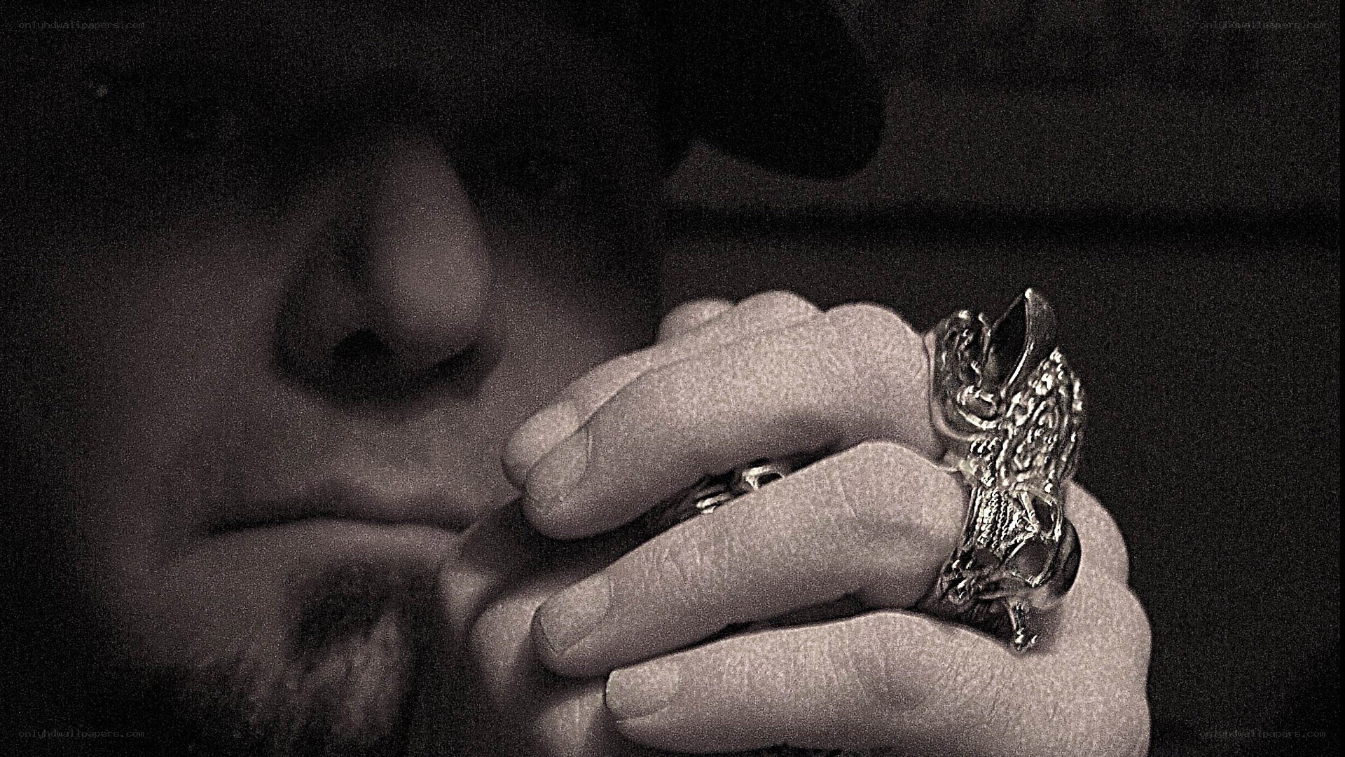 man with rings on hand