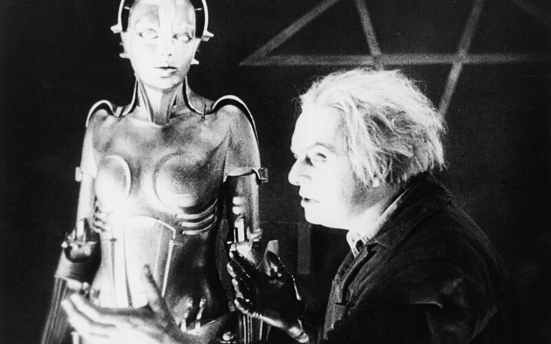 Man with robot figure