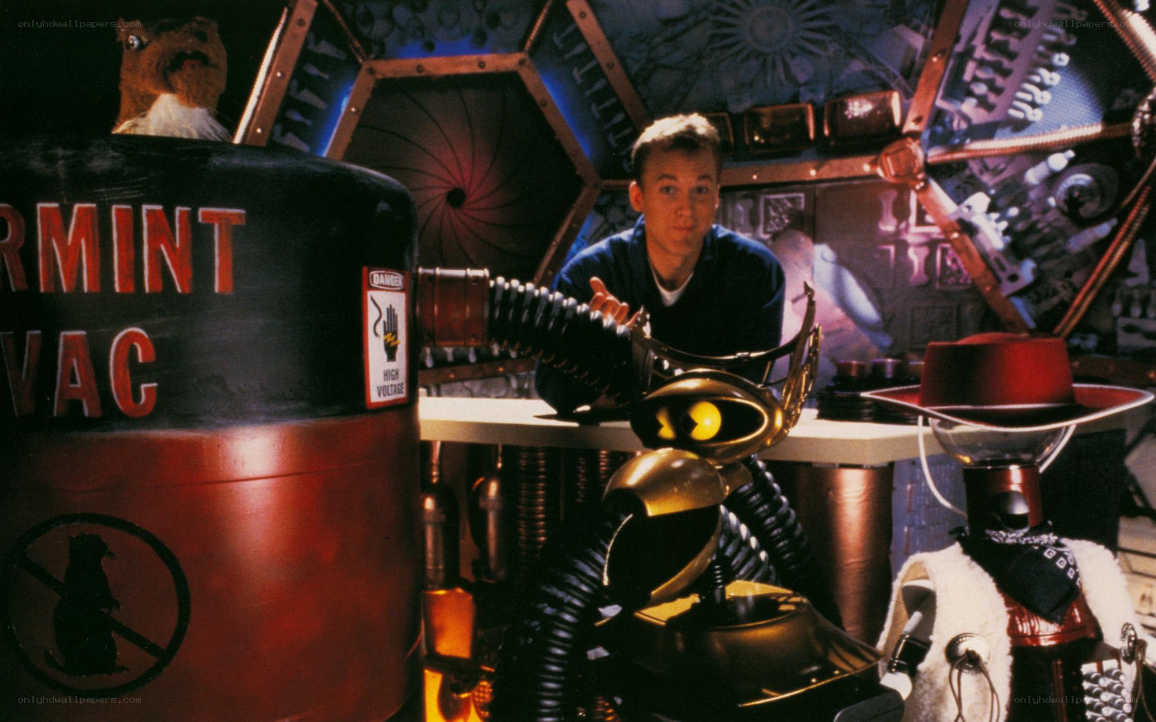 Man with robots in workshop