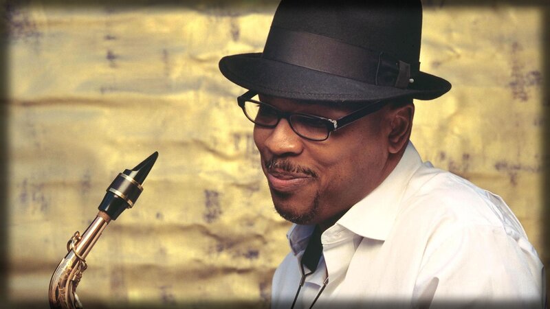 Man with saxophone and hat