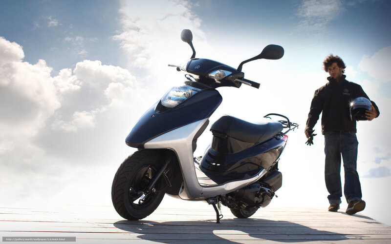 Man with scooter on deck