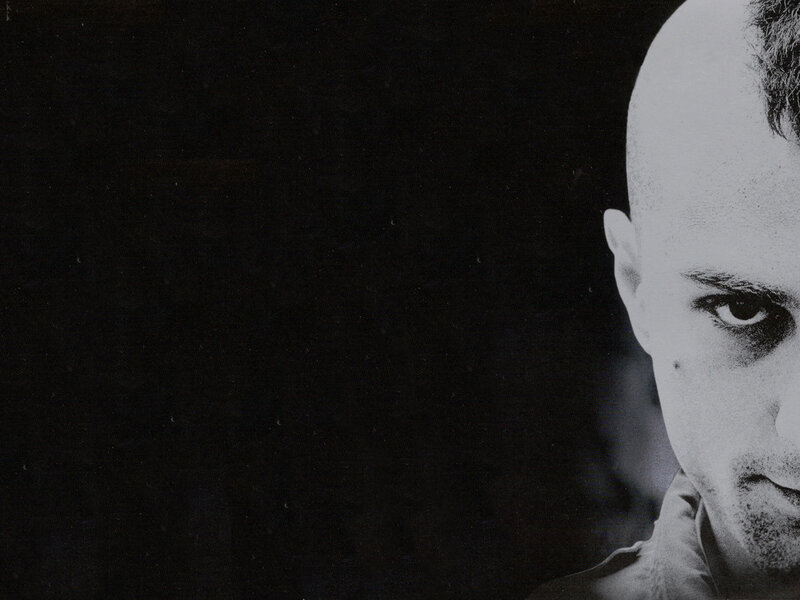 man with shaved head
