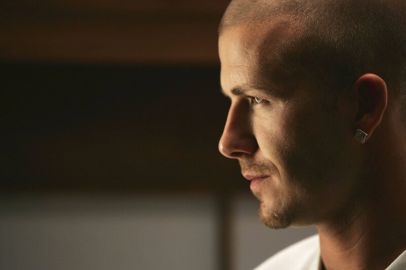 Man with Shaved Head — Brown, Dramatic, Photograph