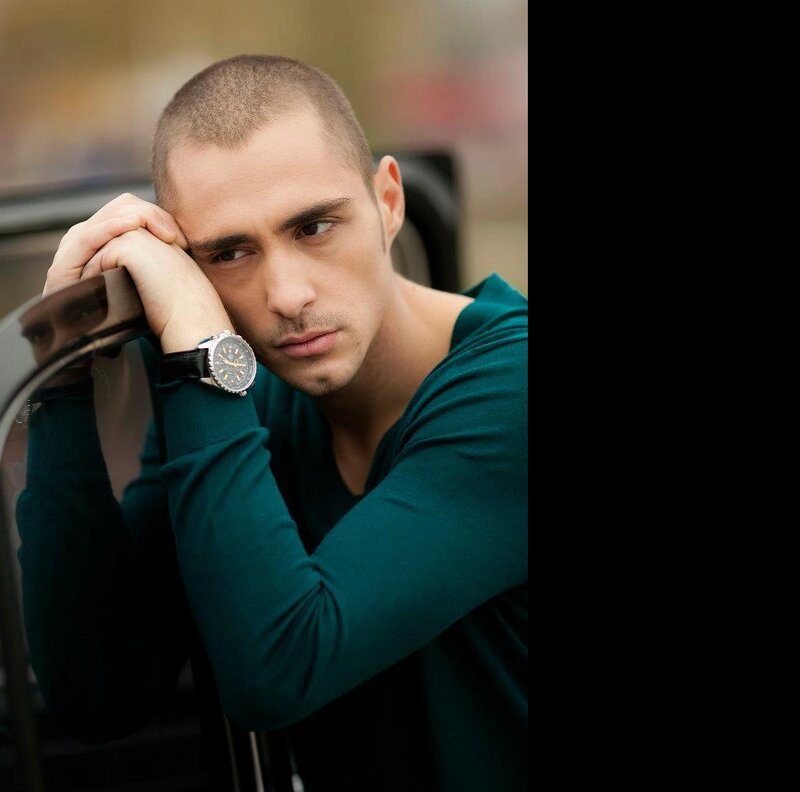 Man with Shaved Head — Green, Contemplative